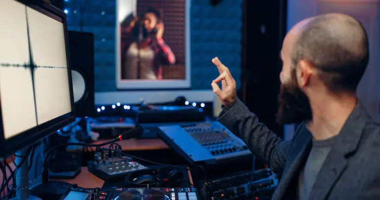 female-singer-in-recording-room-and-sound-engineer-2021-08-26-16-27-02-utc